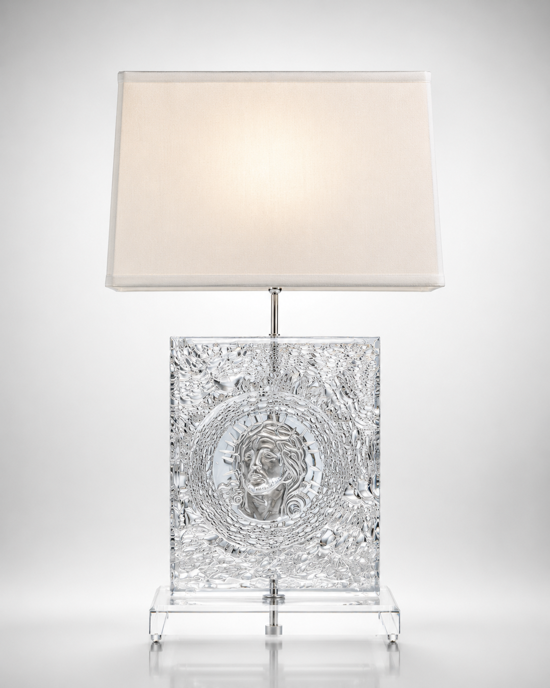 Solid acrylic cube lamp with an etched classical portrait medallion and linen shade