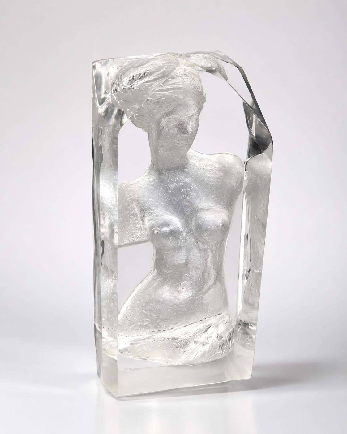 Clear acrylic block sculpture of a female figure titled Venus of the Nile
